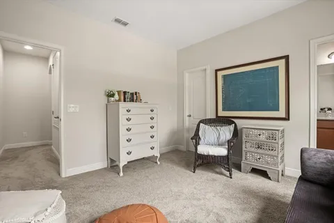 a bedroom with a bed and furniture