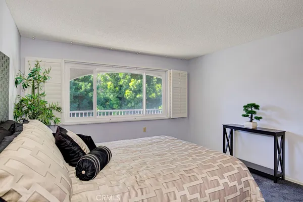 a bathroom with a sink a mirror and a shower