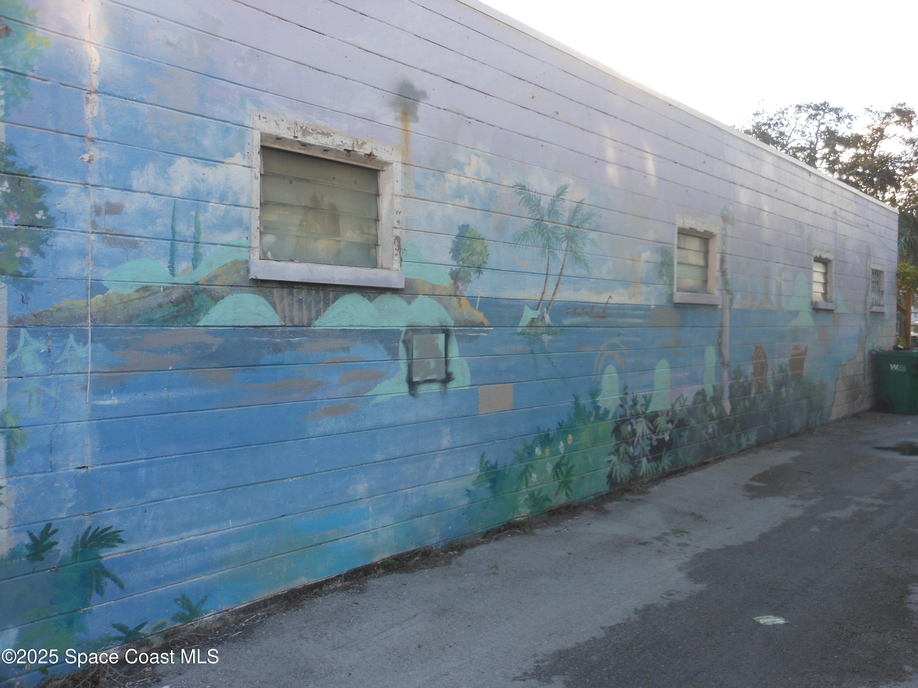2273 Highland Avenue Melbourne, FL 32935 - Photo 12 of 20 a backyard of a house