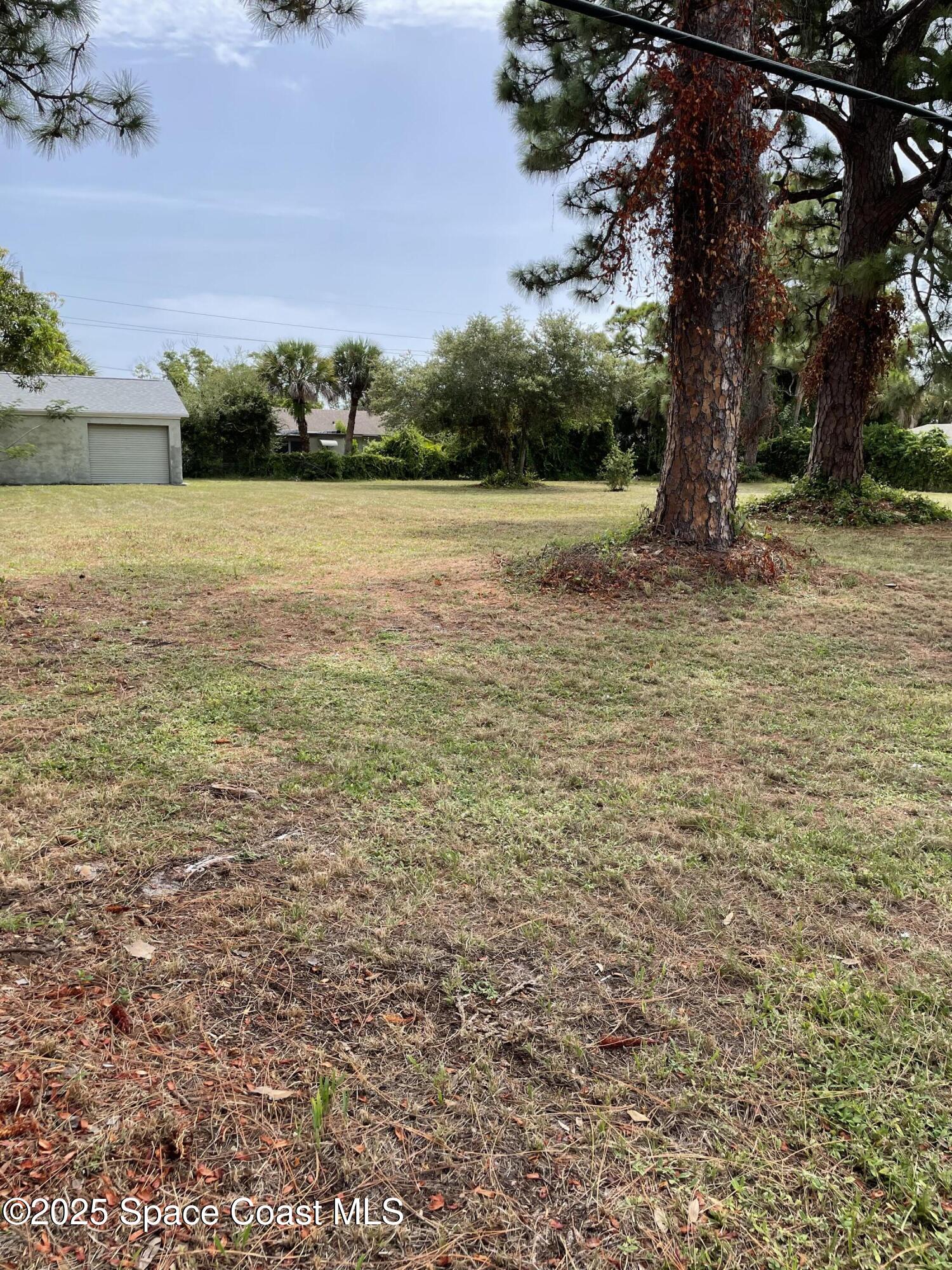 2273 Highland Avenue Melbourne, FL 32935 - Photo 5 of 20 a view of a field with an ocean view