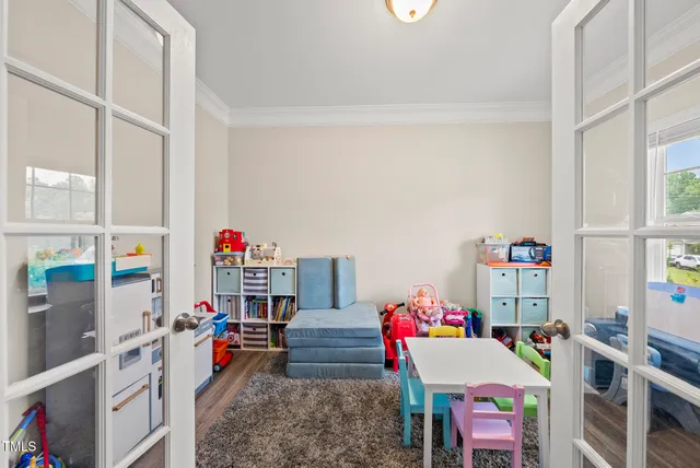 a room with furniture and toys