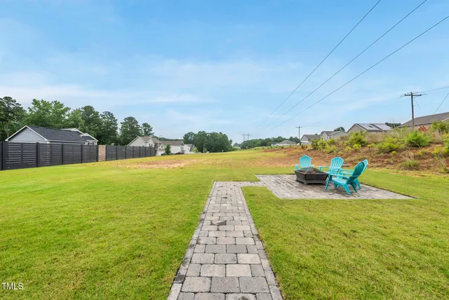 a view of a lake with a big yard