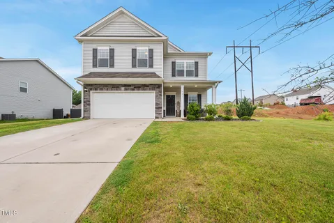 a front view of house with yard