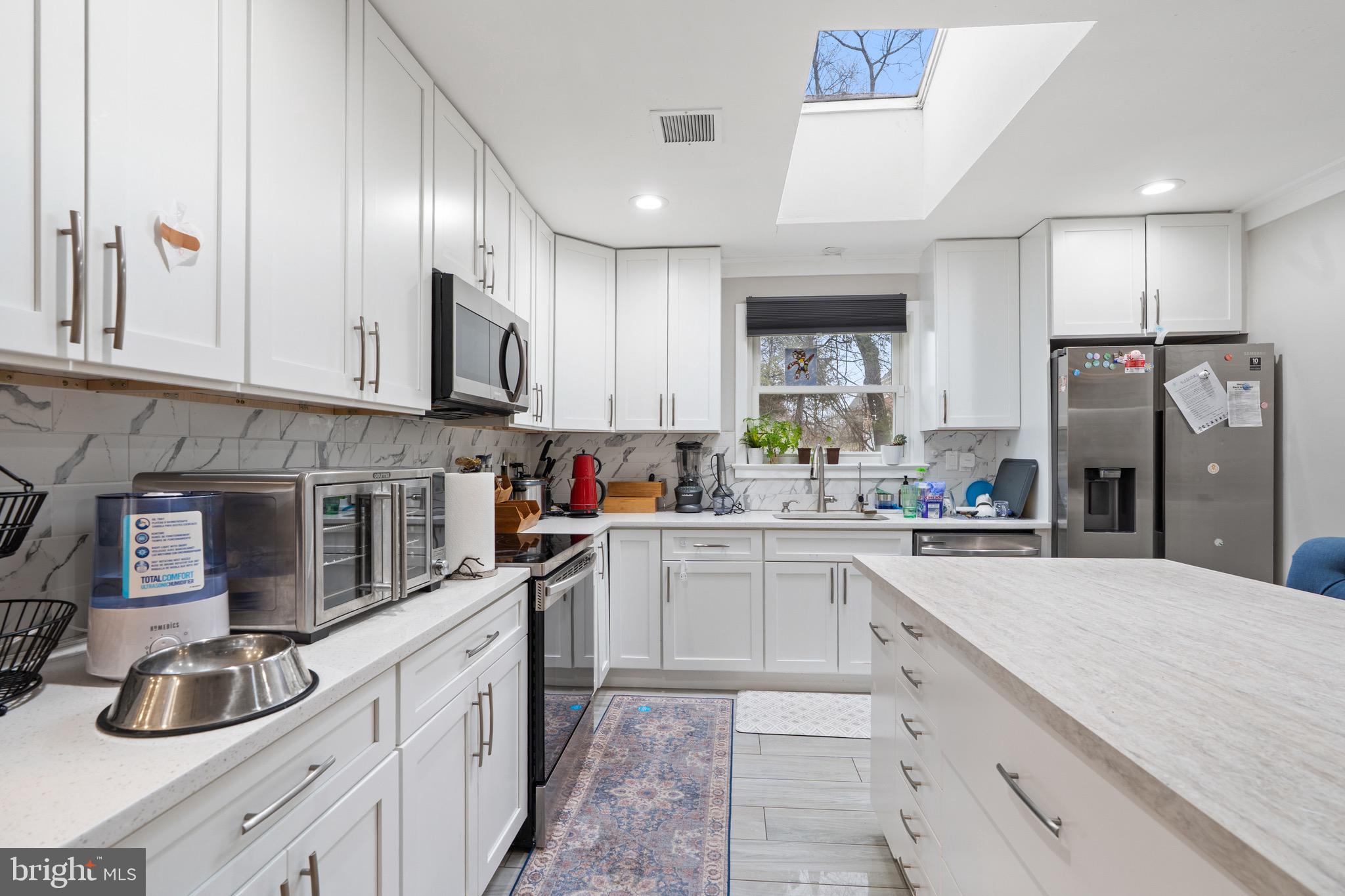 10022 Colvin Run Road Great Falls, VA 22066 - Photo 15 of 33 Upgraded Kitchen with Island