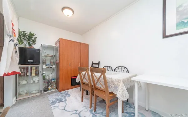a view of a dining room with furniture