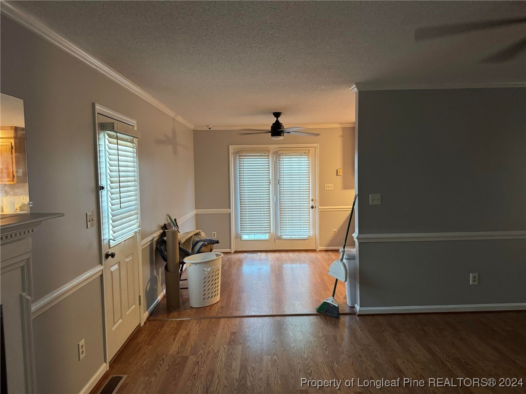 394 Wrench Road Godwin, NC 28344 - Photo 4 of 20 a view of a room with wooden floor and a window