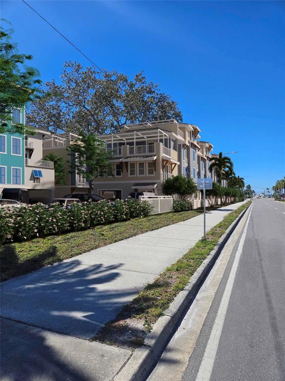 16 Outlook Way, Unit 9 Dunedin, FL 34698 - Photo 24 of 77 a view of a house with a yard