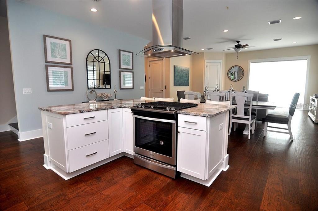 16 Outlook Way, Unit 9 Dunedin, FL 34698 - Photo 34 of 77 a kitchen with a stove oven and sink