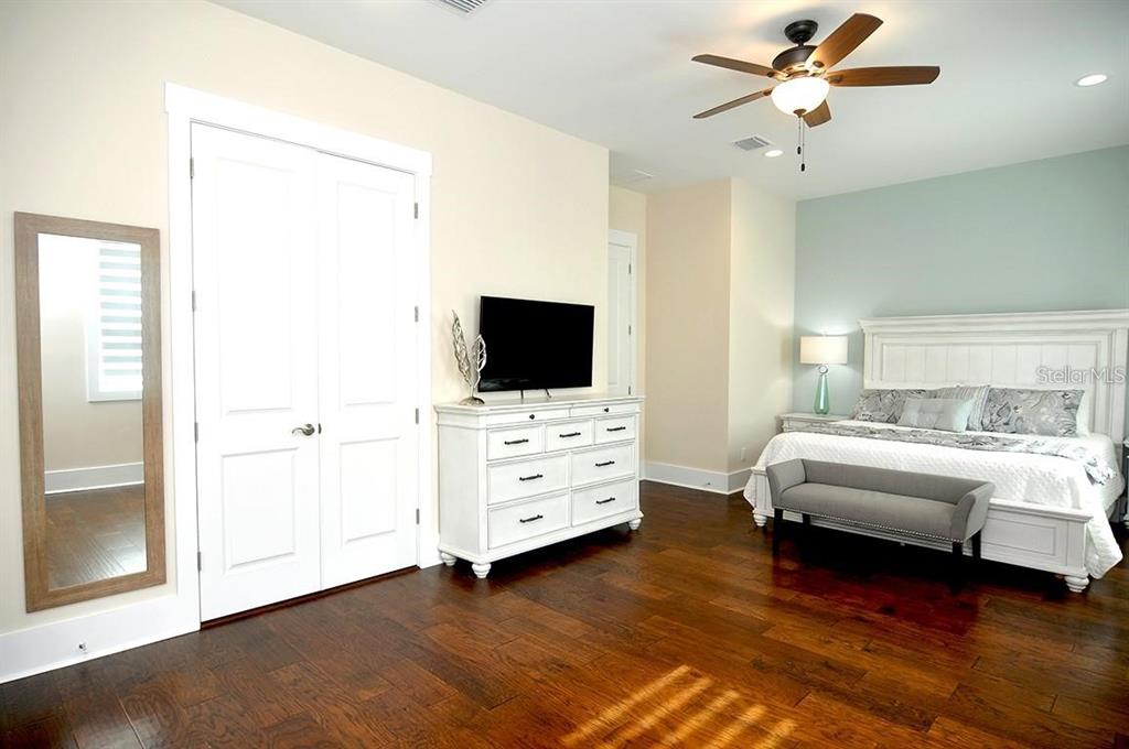 16 Outlook Way, Unit 9 Dunedin, FL 34698 - Photo 52 of 77 a view of living room with furniture and flat screen tv