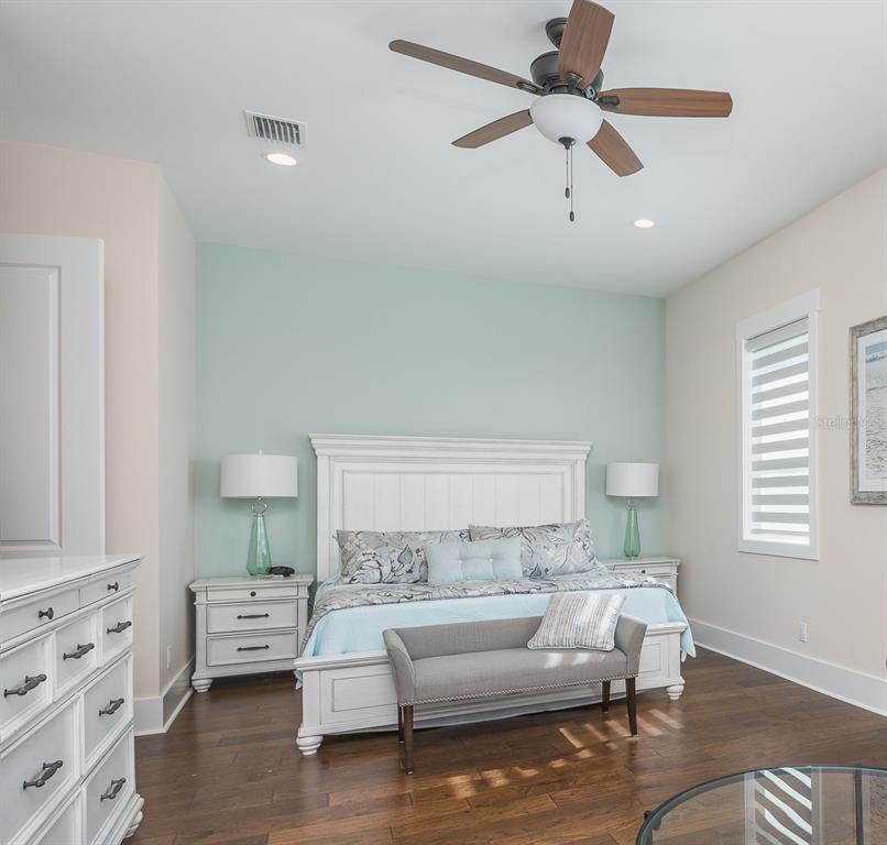 16 Outlook Way, Unit 9 Dunedin, FL 34698 - Photo 68 of 77 a living room with furniture and a wooden floor