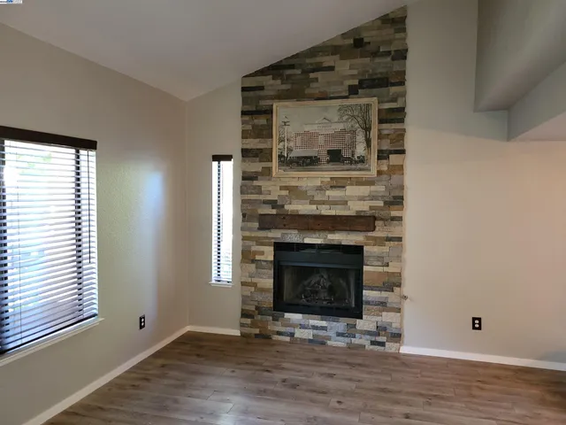 a living room with a fireplace in it