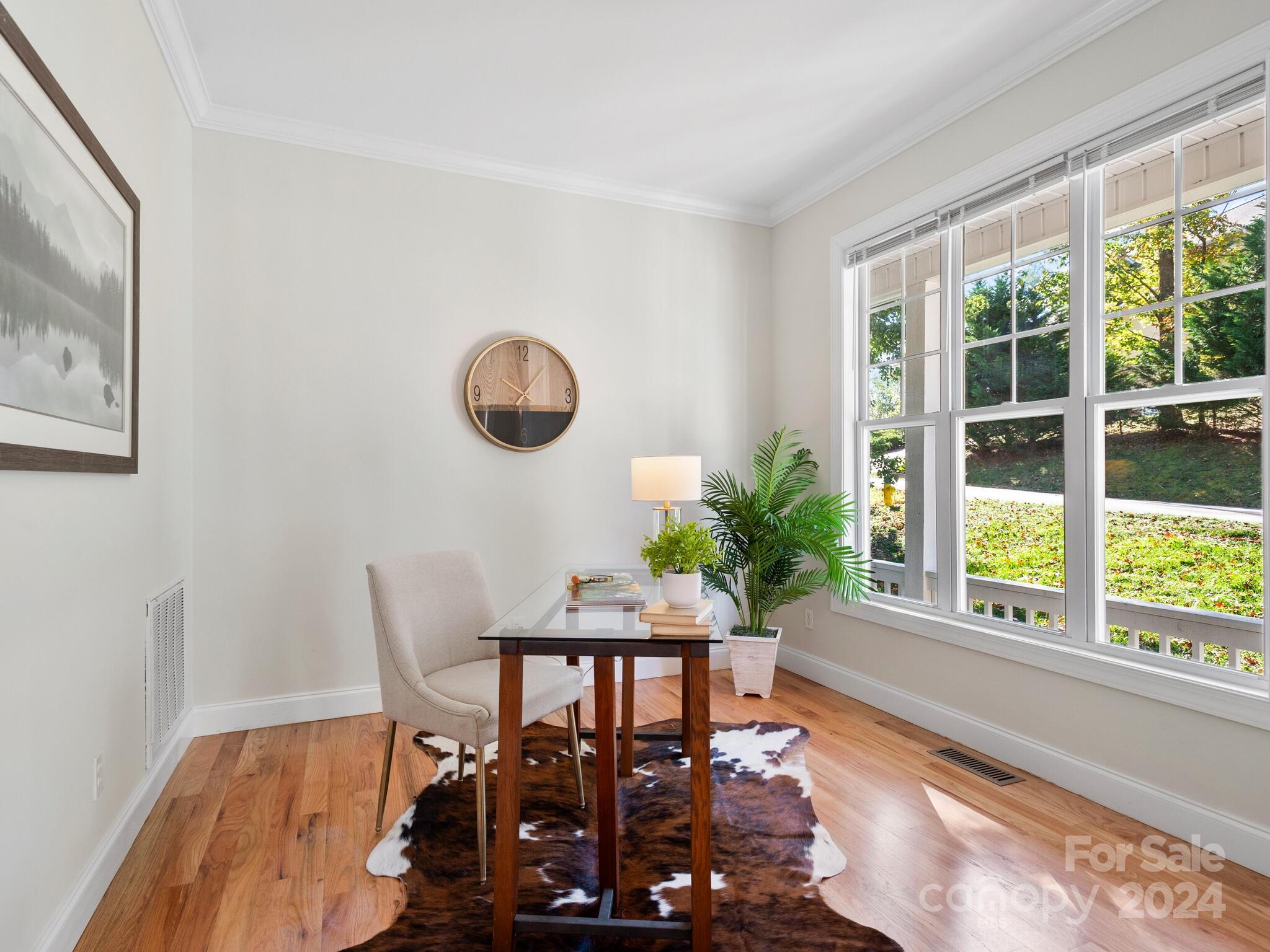 9 Forest Spring Drive Asheville, NC 28804 - Photo 18 of 42 a view of a dining room with furniture window and outside view