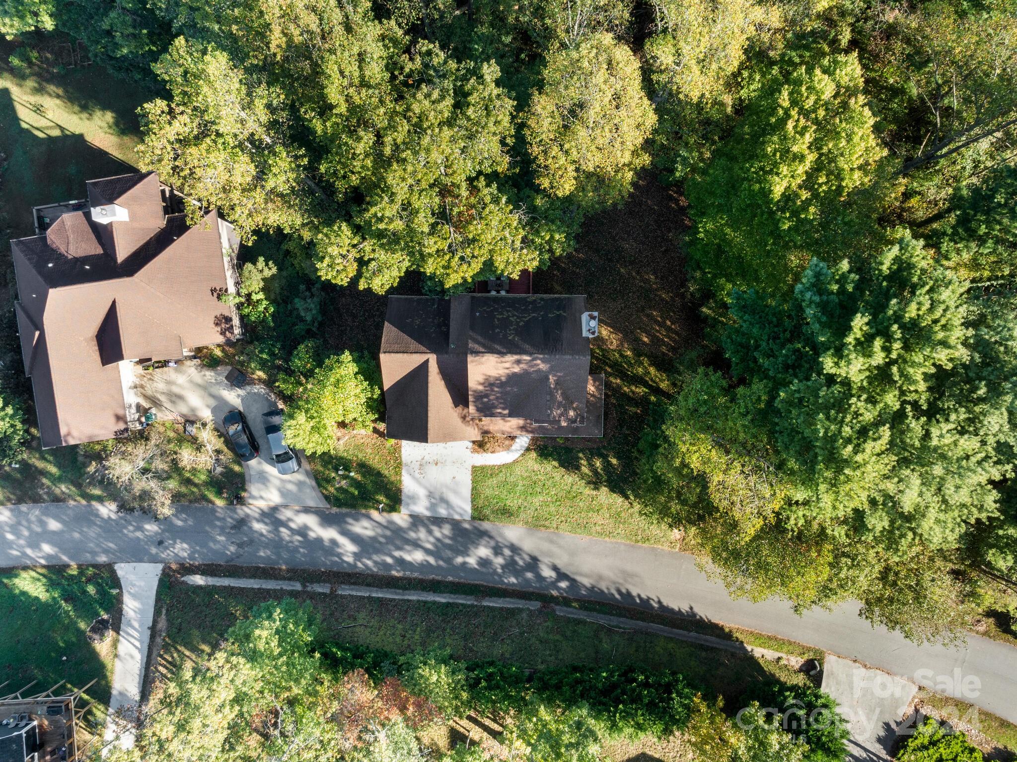 9 Forest Spring Drive Asheville, NC 28804 - Photo 39 of 42 a backyard of a house with lots of green space