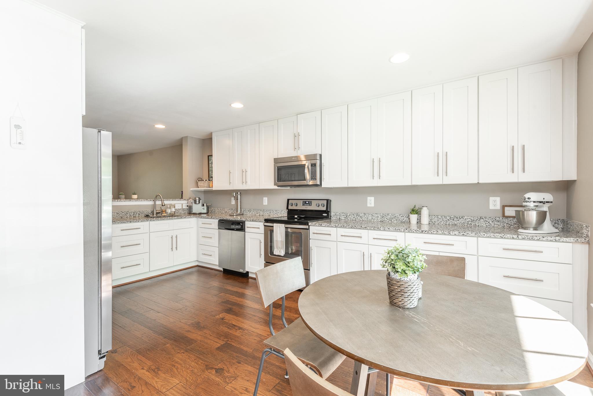 8977 Omega Court Springfield, VA 22152 - Photo 4 of 29 Amazing Open Kitchen - 42" Cabinets/Rec Lighting