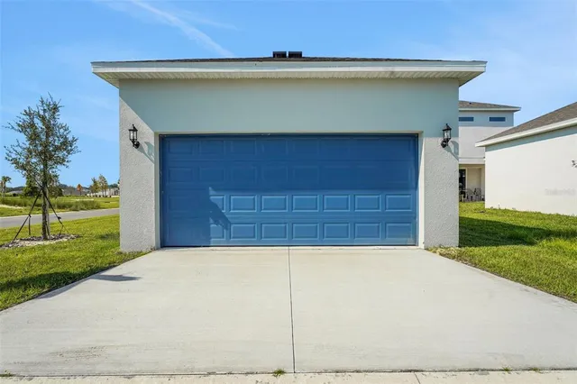 a view of a house with garage
