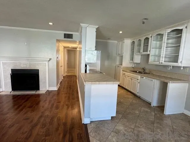 a bedroom with a bed and a ceiling fan