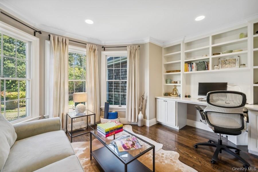39 Smugglers Path Riverhead, NY 11901 - Photo 15 of 48 a living room with furniture and a large window