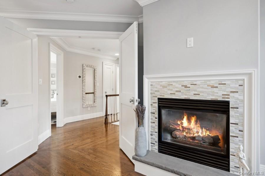 39 Smugglers Path Riverhead, NY 11901 - Photo 18 of 48 a living room with a fireplace