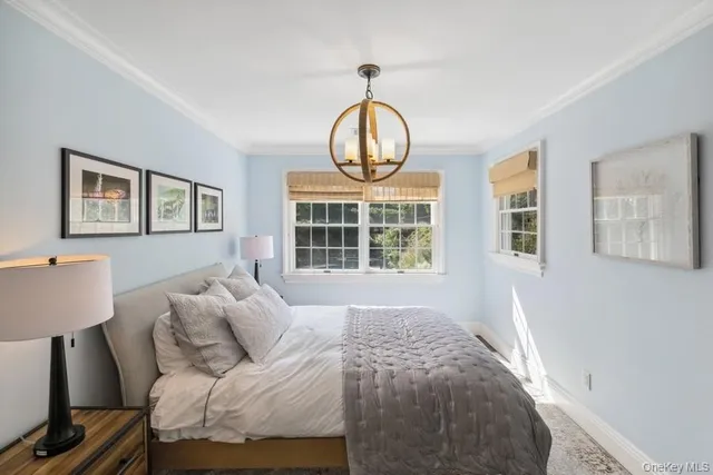 a view of a room with wooden furniture
