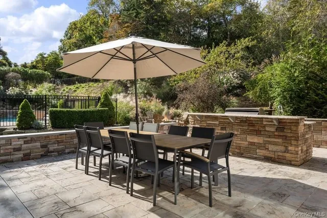 a view of yard with patio