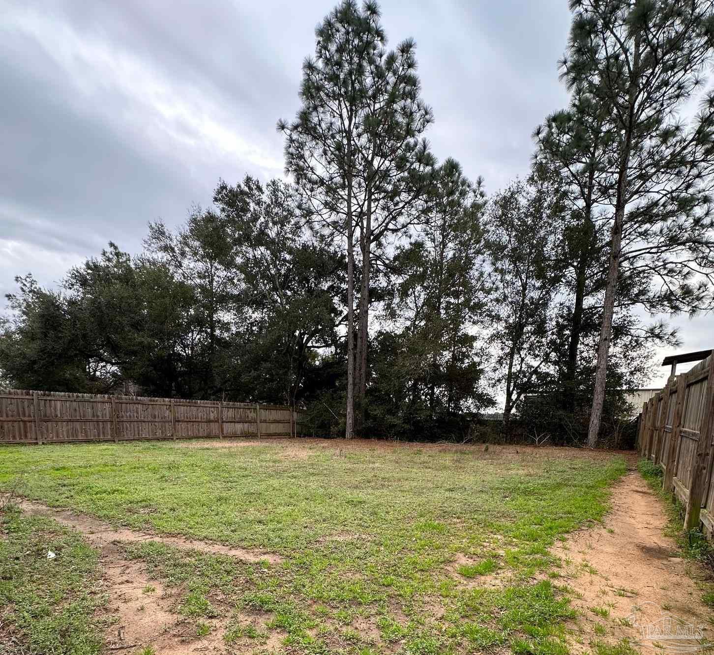 5933 Fairlands Road Milton, FL 32583 - Photo 16 of 16 a view of backyard with green space