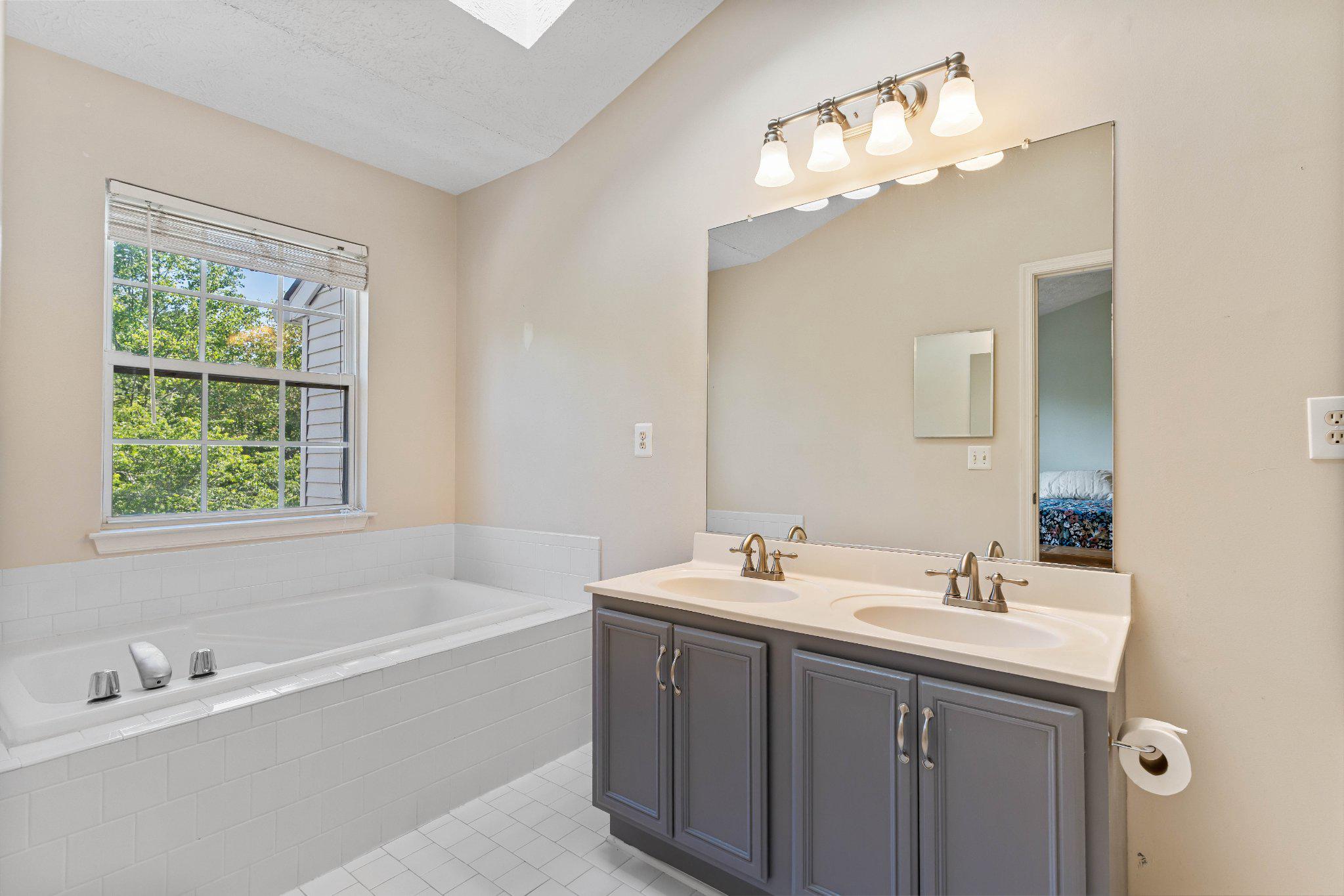 1369 Escapade Court Riva, MD 21140 - Photo 19 of 46 Soaking tub with overhead skylight
