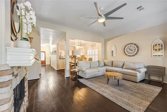 a kitchen with stainless steel appliances granite countertop a stove and a microwave
