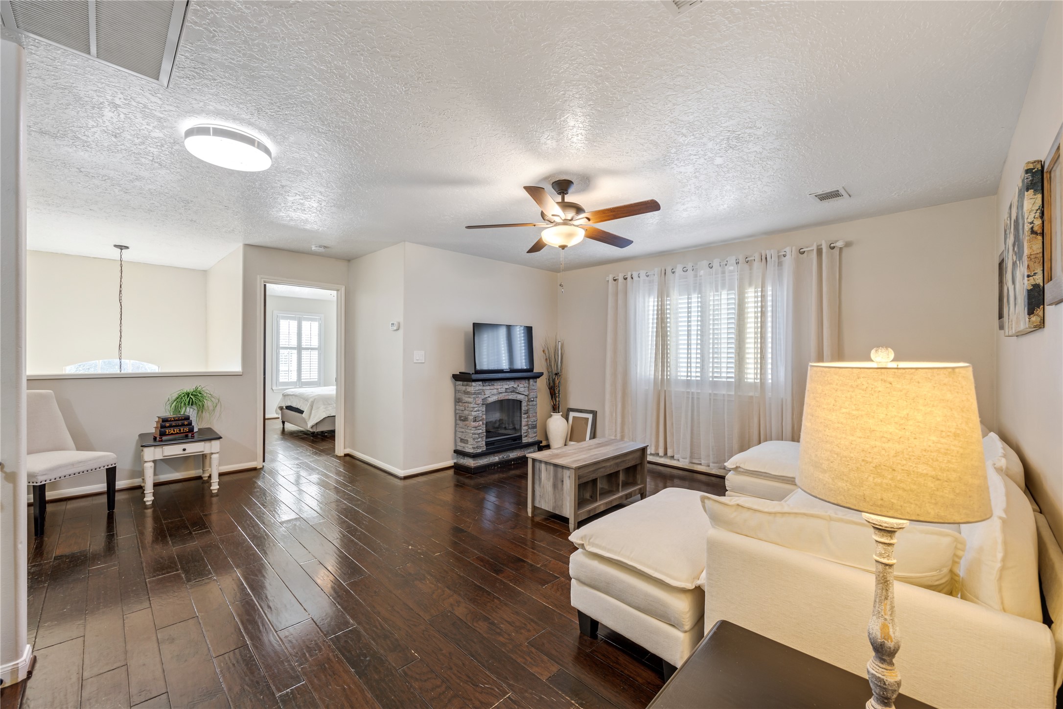 23106 Oxbow Trail Spring, TX 77373 - Photo 29 of 43 a living room with furniture and a wooden floor