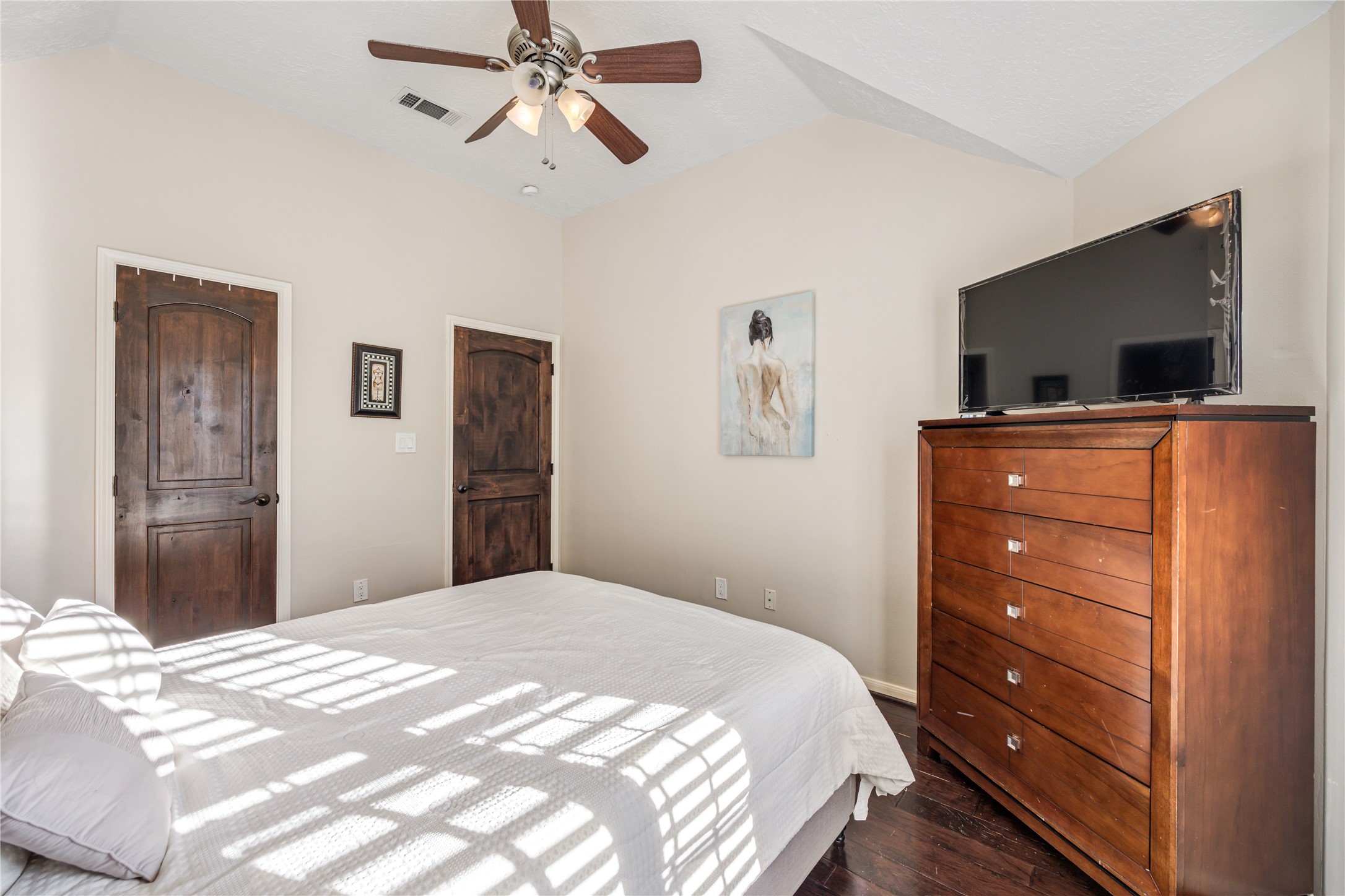 23106 Oxbow Trail Spring, TX 77373 - Photo 32 of 43 a bedroom with a bed and a flat screen tv