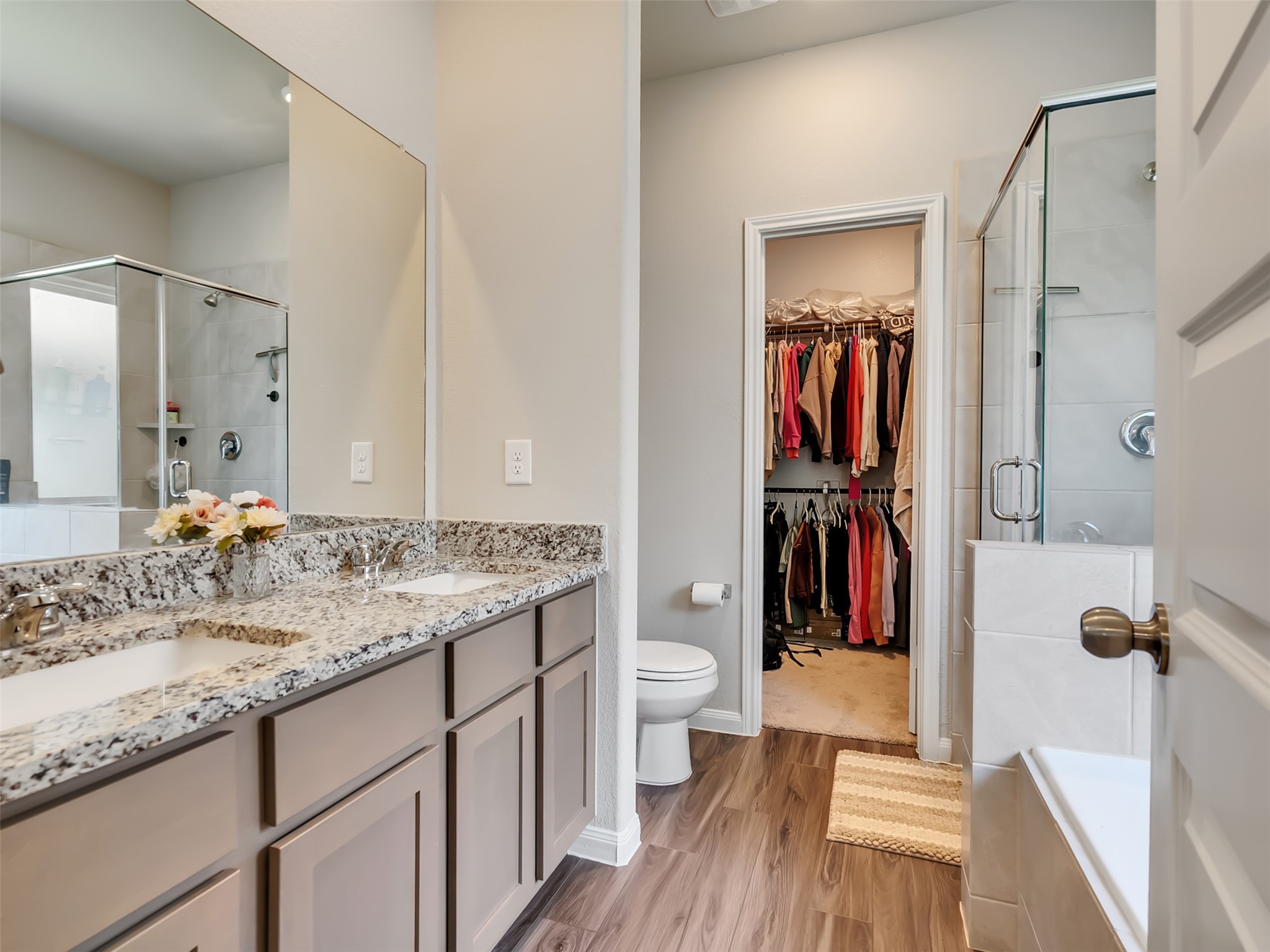2416 Bluefish Court Conroe, TX 77384 - Photo 23 of 45 a bathroom with a sink and a mirror