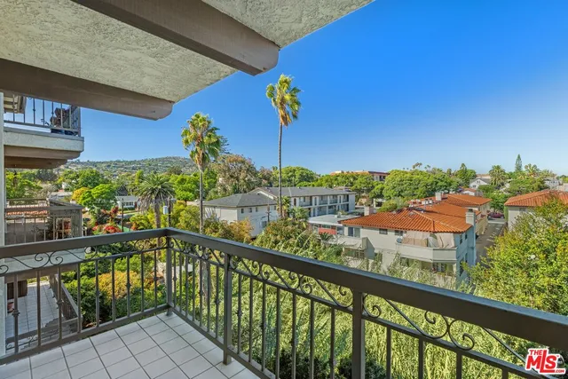 a view of a city from a balcony