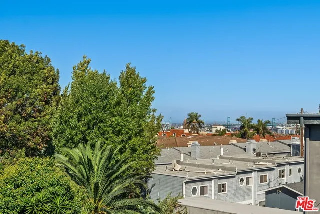 a view of a house with outdoor space and sitting area