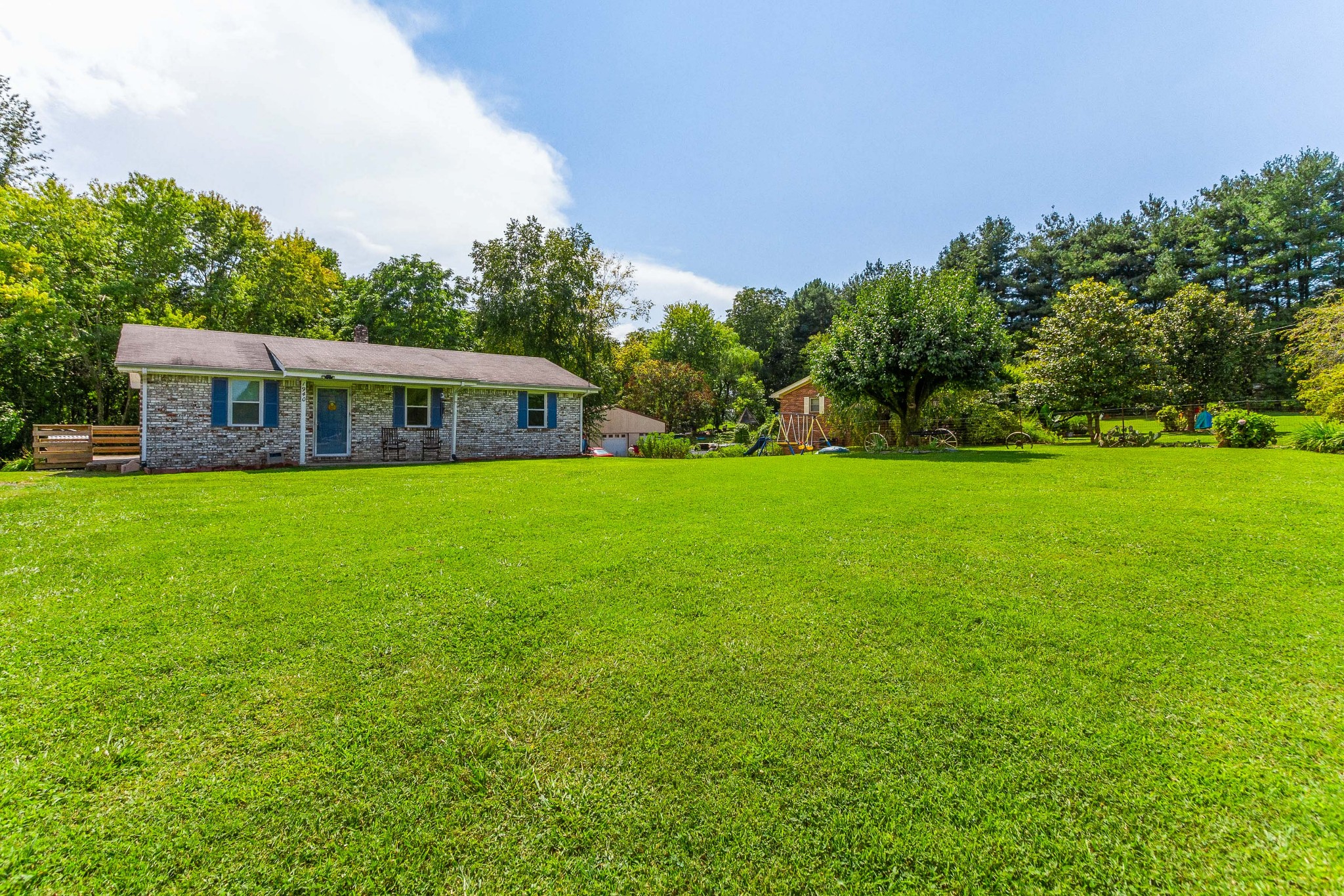 a view of a house with a big yard