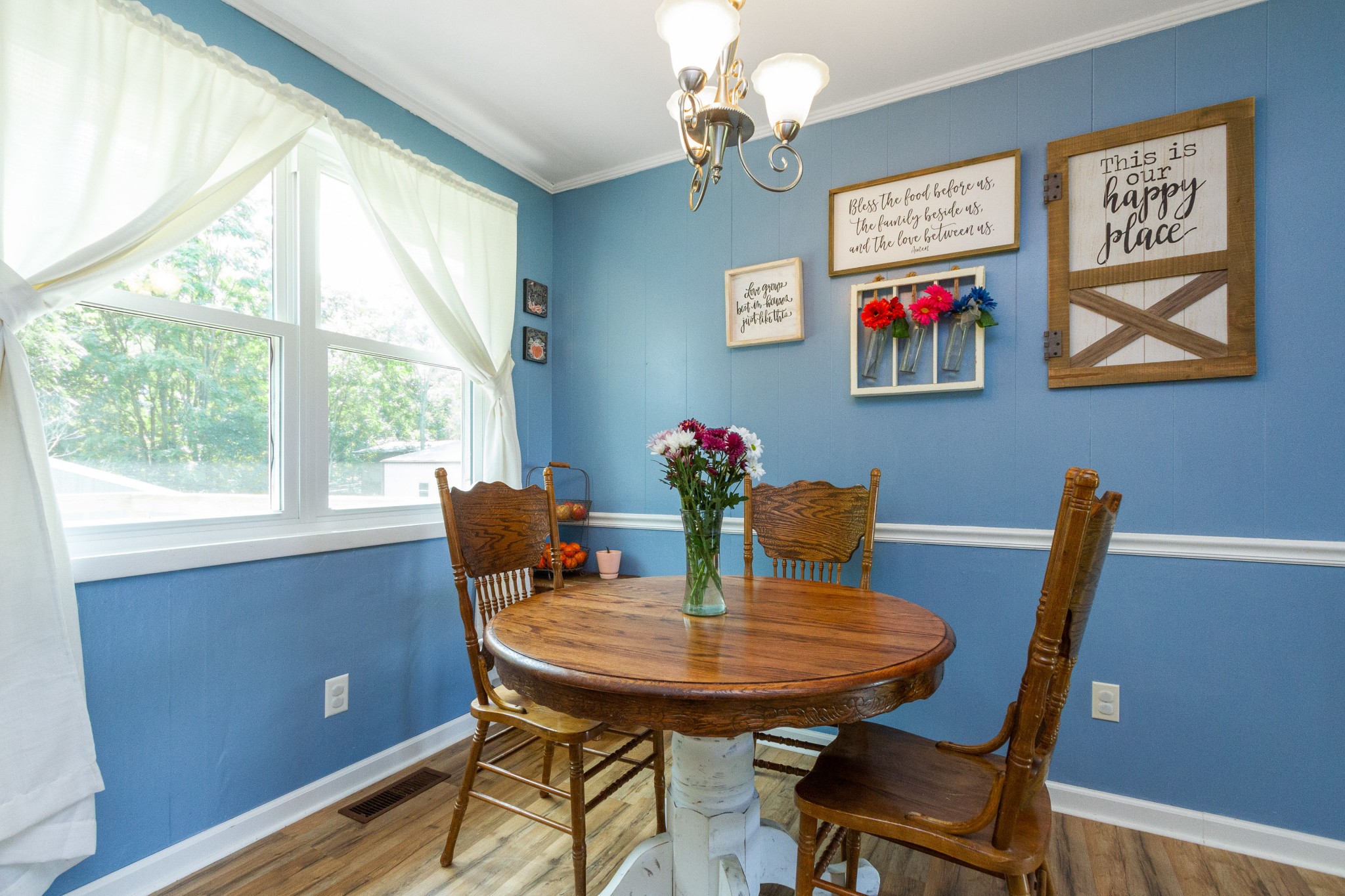 1940 Austin Road Lafayette, TN 37083 - Photo 16 of 41 a view of a dining room with furniture window and wooden floor