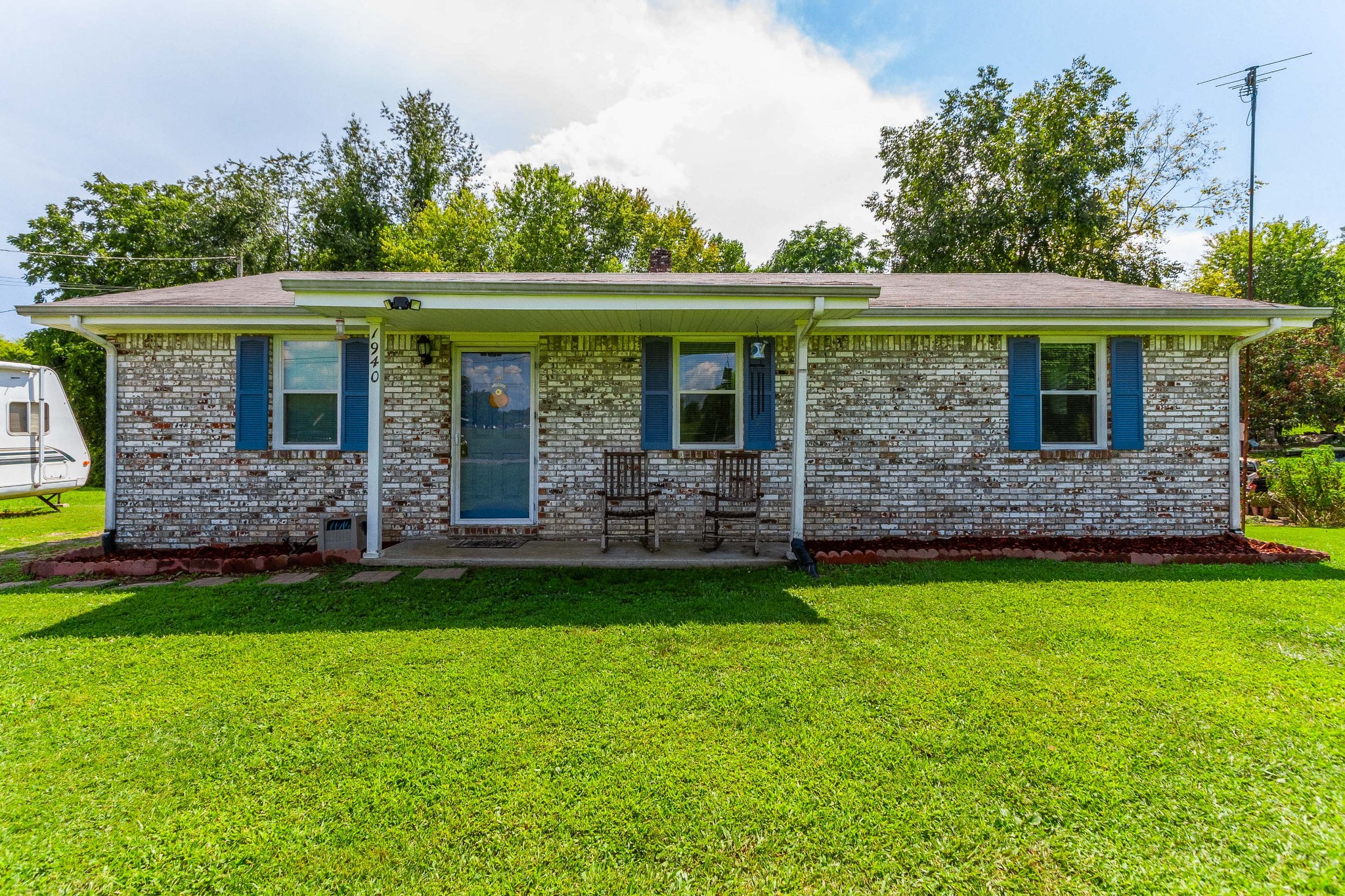 1940 Austin Road Lafayette, TN 37083 - Photo 2 of 41 a view of a porch with a backyard