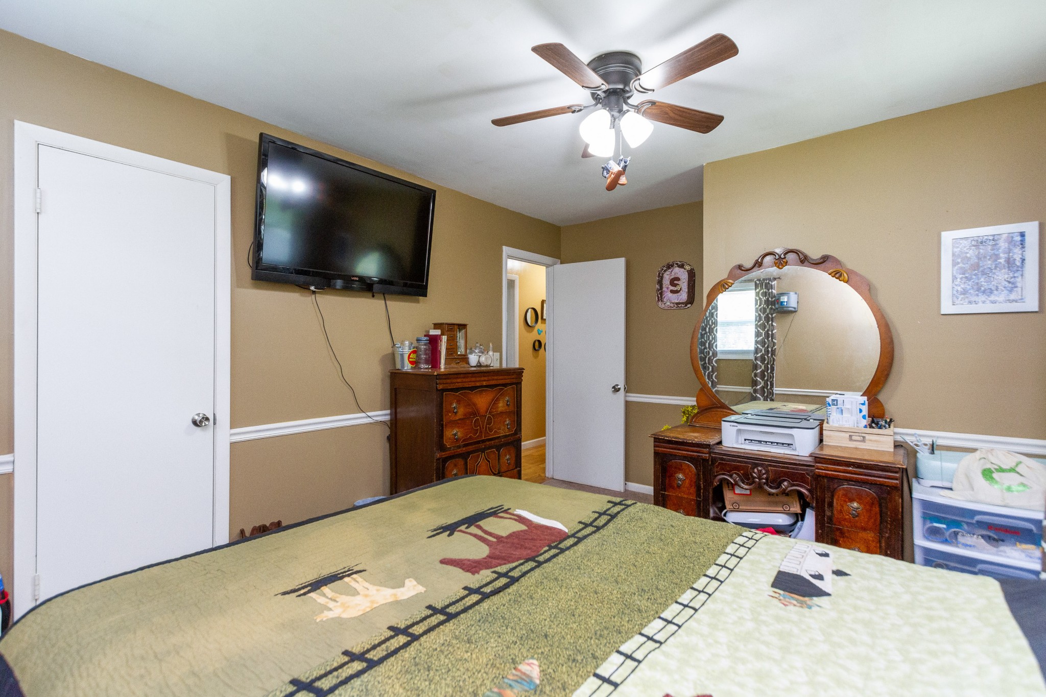 1940 Austin Road Lafayette, TN 37083 - Photo 24 of 41 a bedroom with a bed and a flat screen tv