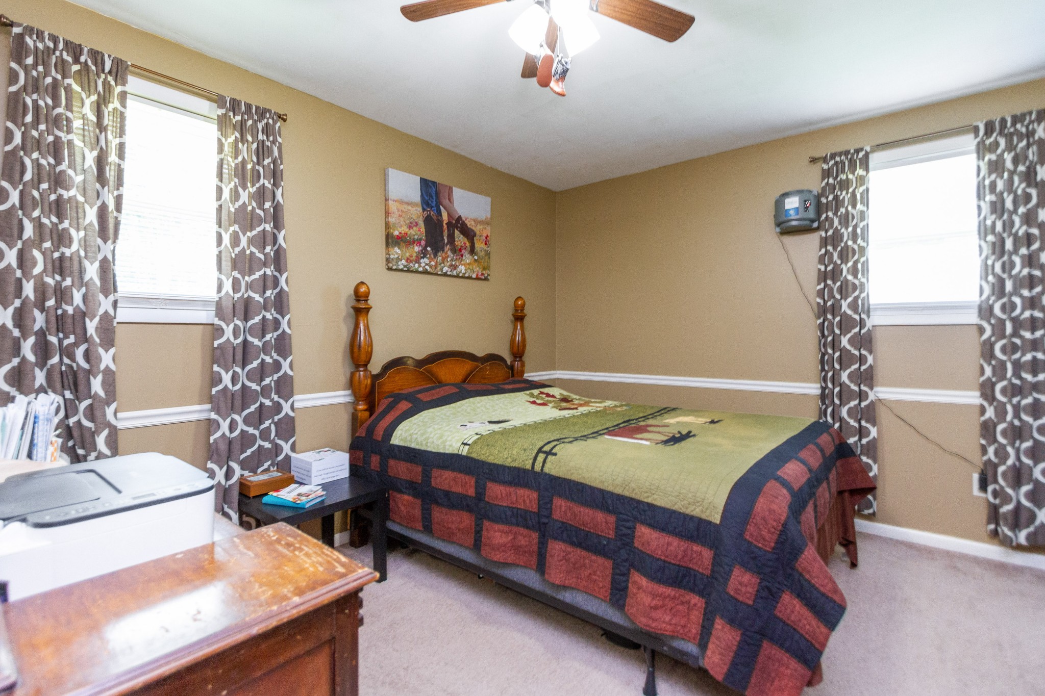 1940 Austin Road Lafayette, TN 37083 - Photo 26 of 41 a bedroom with a bed and a table