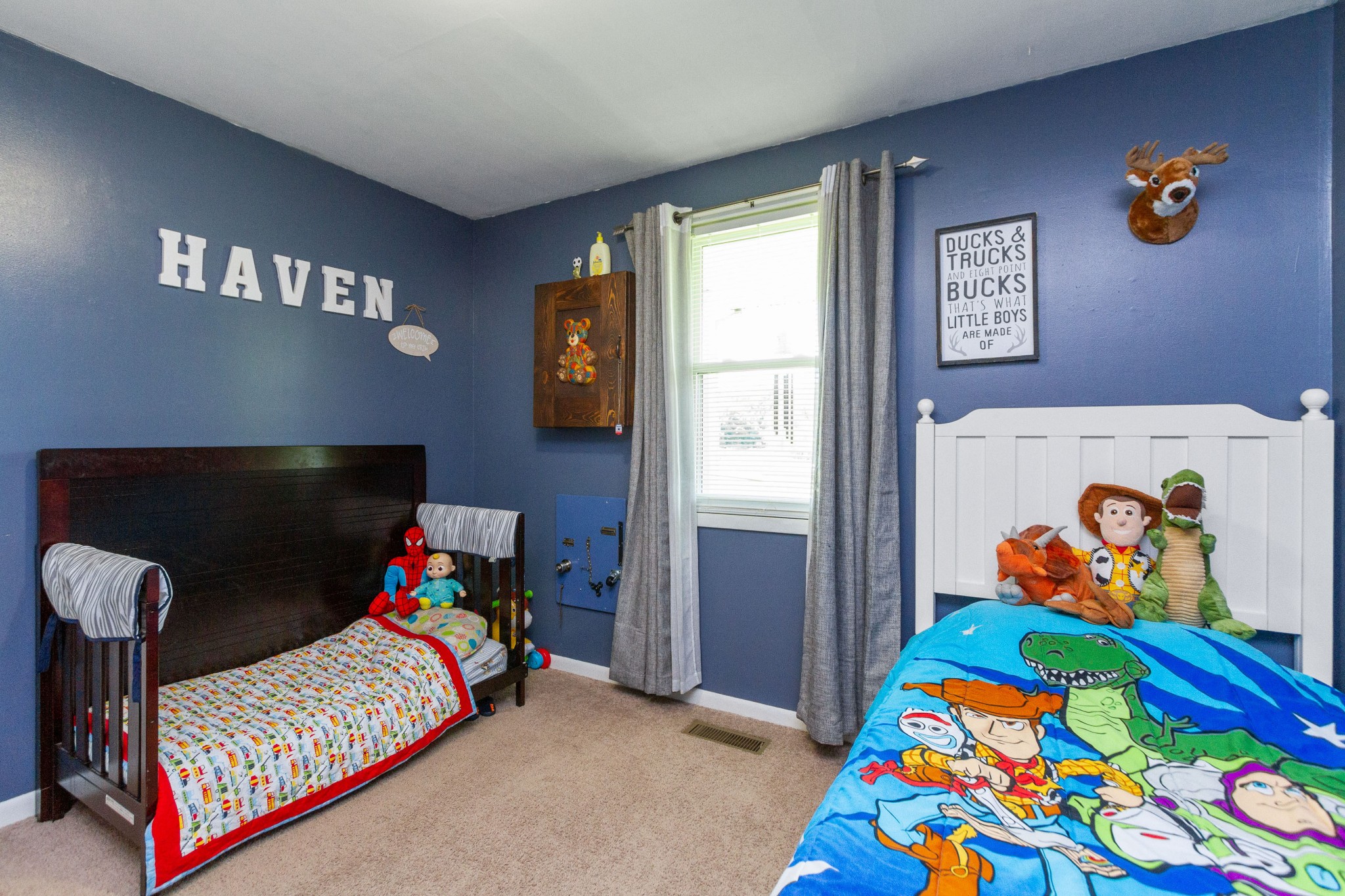 1940 Austin Road Lafayette, TN 37083 - Photo 30 of 41 a bedroom with baby bed and window