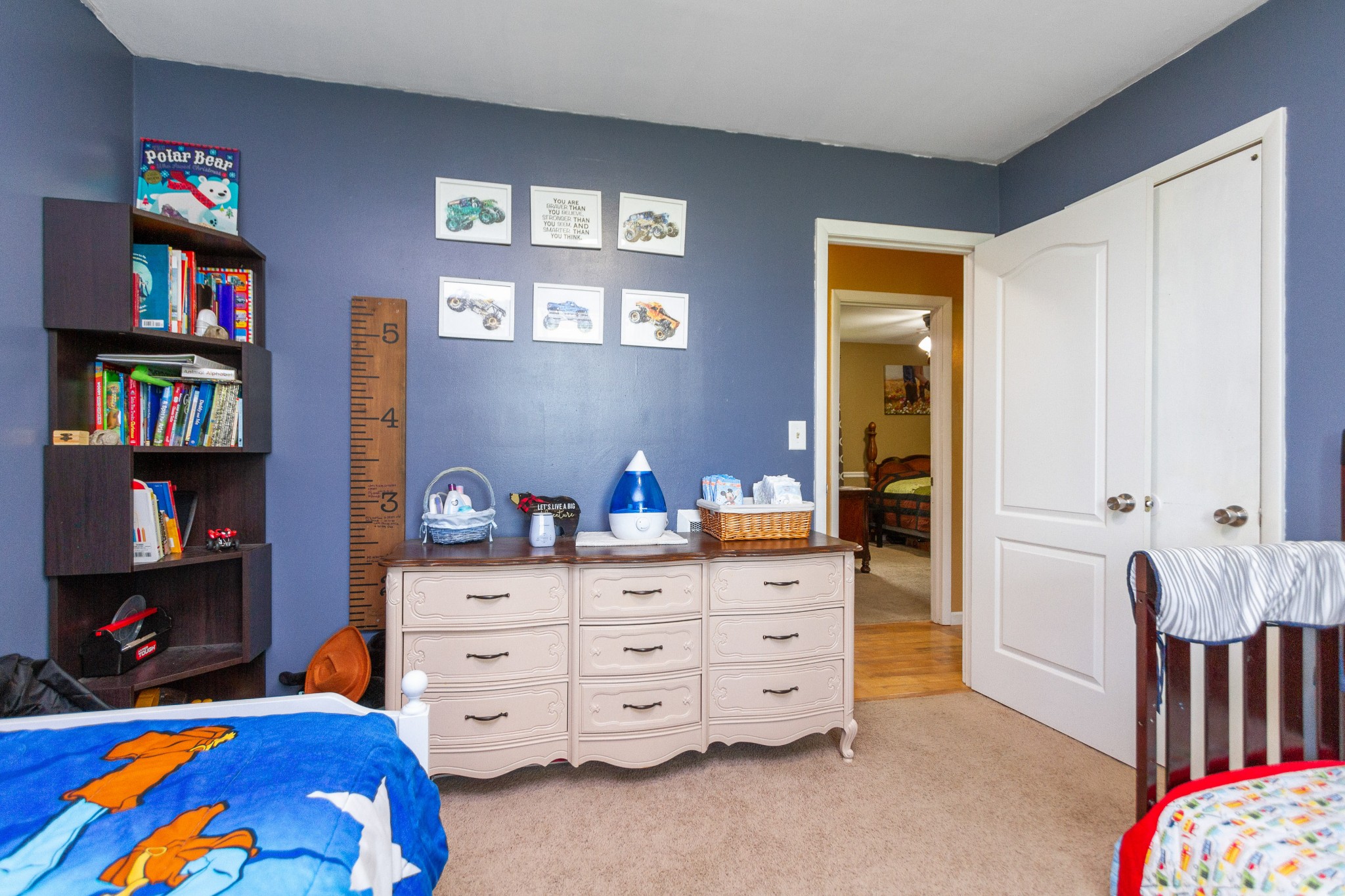 1940 Austin Road Lafayette, TN 37083 - Photo 31 of 41 a bedroom with furniture and a lamp