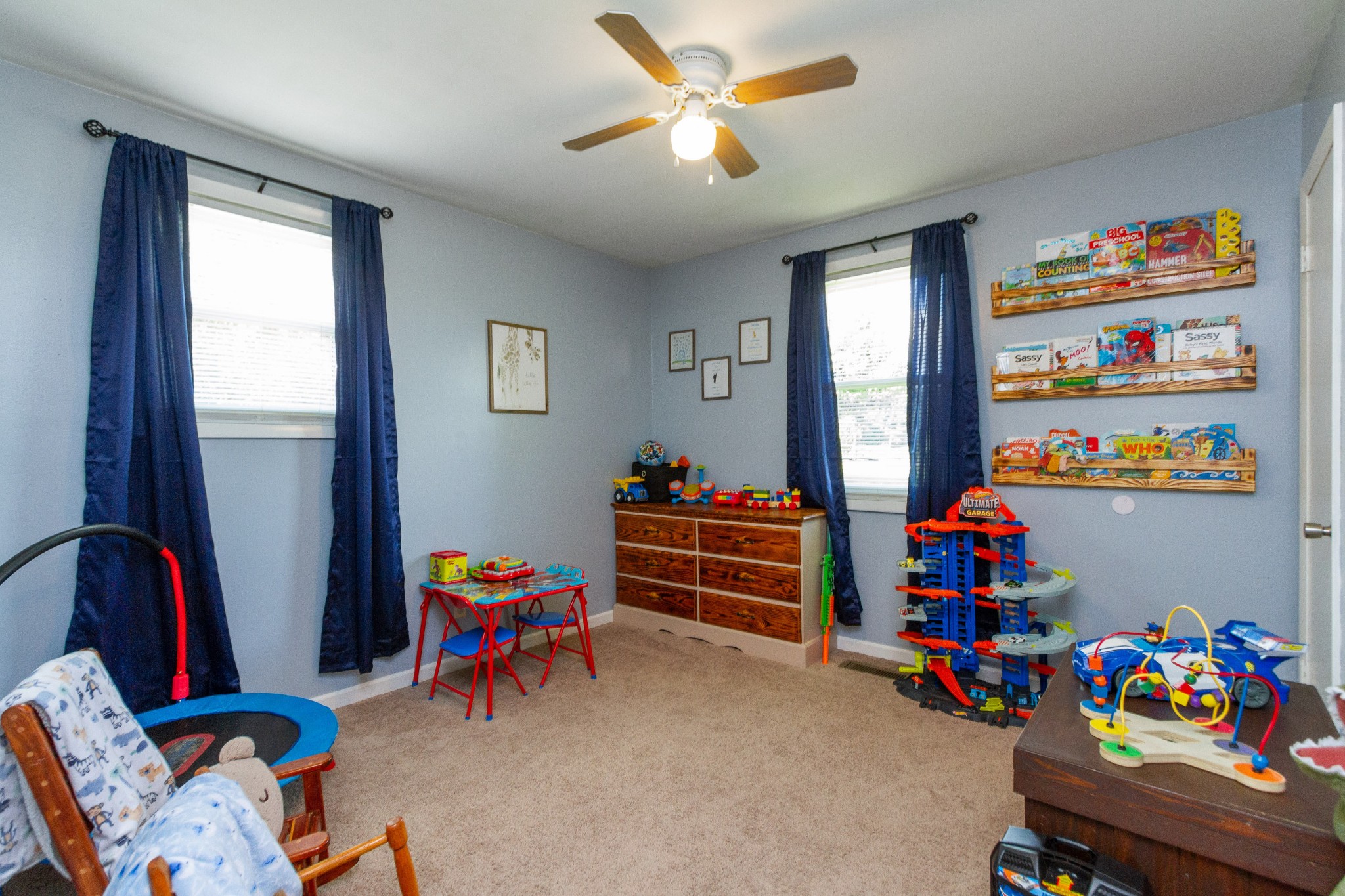 1940 Austin Road Lafayette, TN 37083 - Photo 32 of 41 a children room with toys and a wooden floor