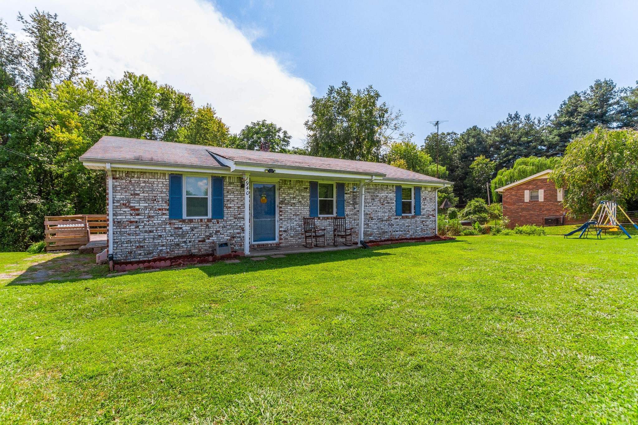 1940 Austin Road Lafayette, TN 37083 - Photo 4 of 41 a view of a house with a backyard