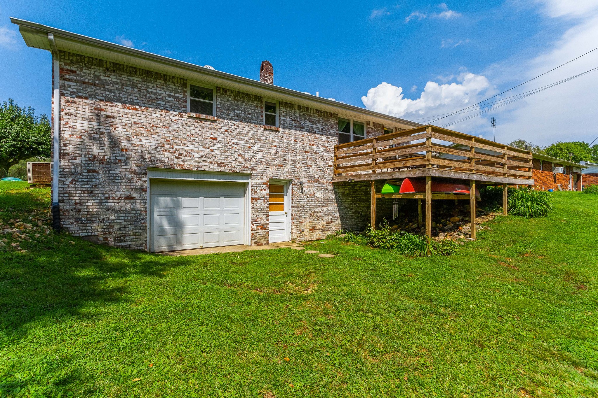 1940 Austin Road Lafayette, TN 37083 - Photo 8 of 41 a front view of a house with a yard