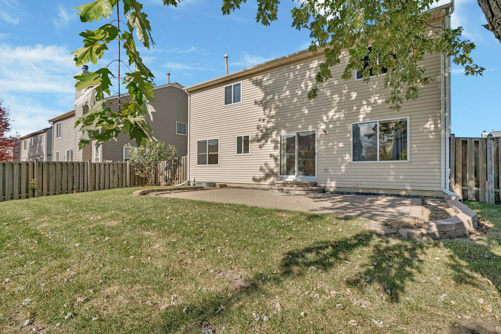 2509 Rosehall Lane Aurora, IL 60503 - Photo 50 of 51 a view of a house with backyard and sitting area