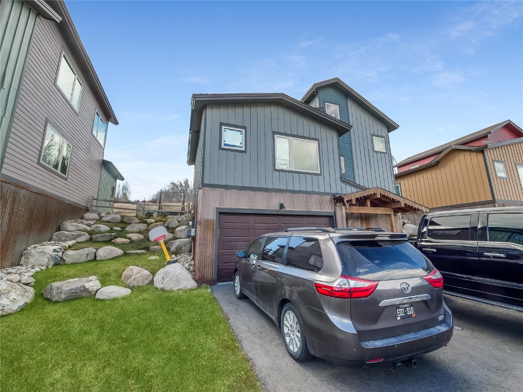 a car parked in front of a house