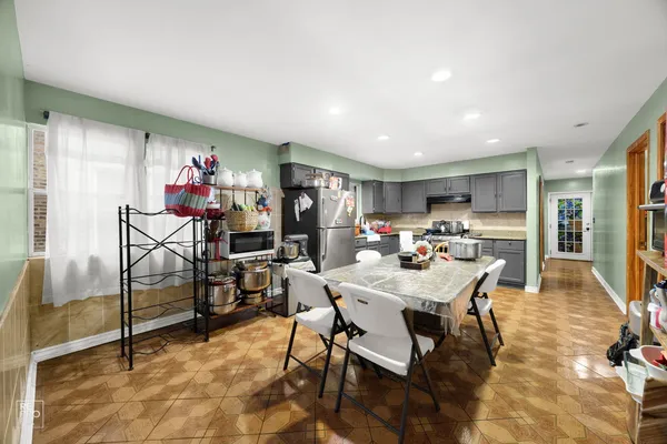 a view of a dining room with furniture