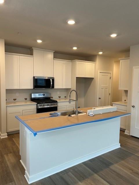 126 River Ridge Drive Coraopolis, PA 15108 - Photo 2 of 29 a kitchen with stainless steel appliances granite countertop a sink a stove and a refrigerator