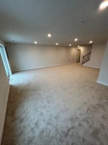 a view of a room that has washer and dryer
