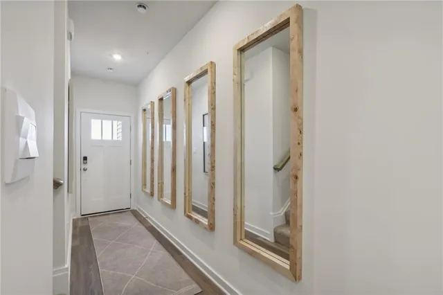 a view of a bathroom from the hallway