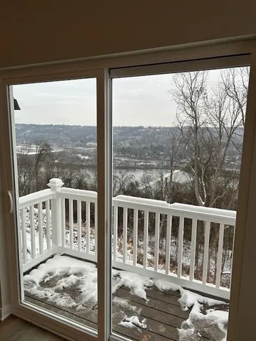 a view of a blue and white house in the background