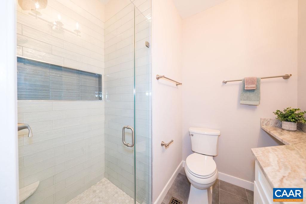 780 Broomley Road Charlottesville, VA 22901 - Photo 23 of 44 a bathroom with a toilet and a shower